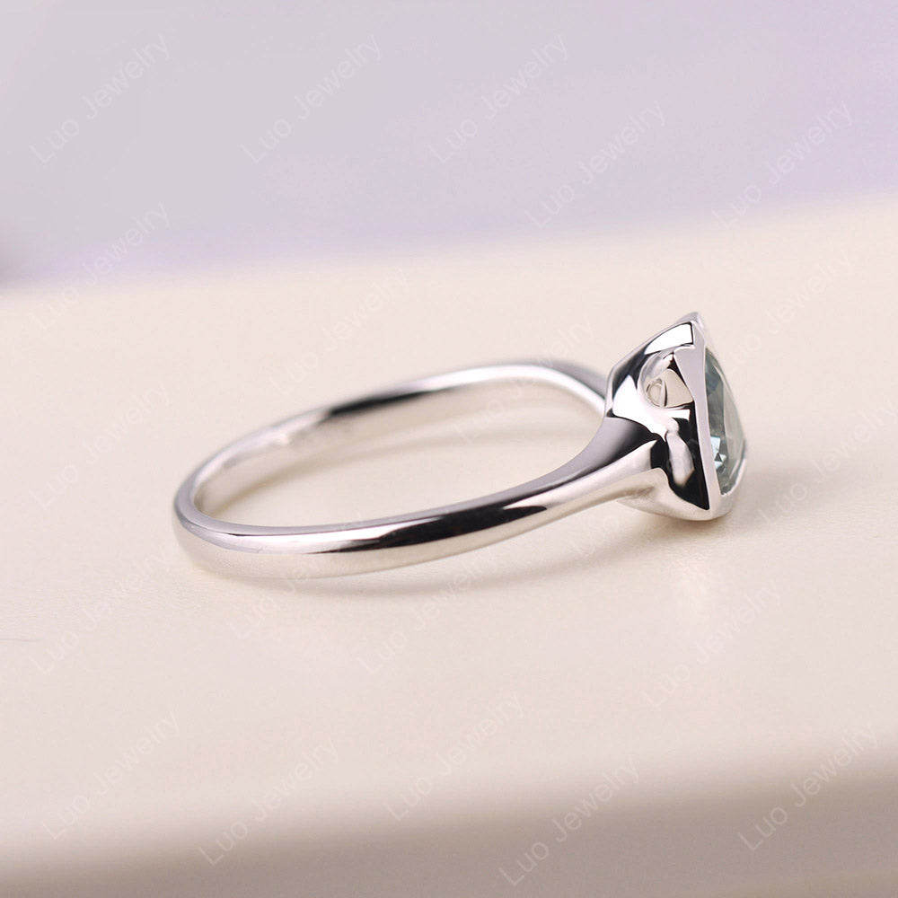 Cat Trillion Cut Aquamarine Bezel Ring