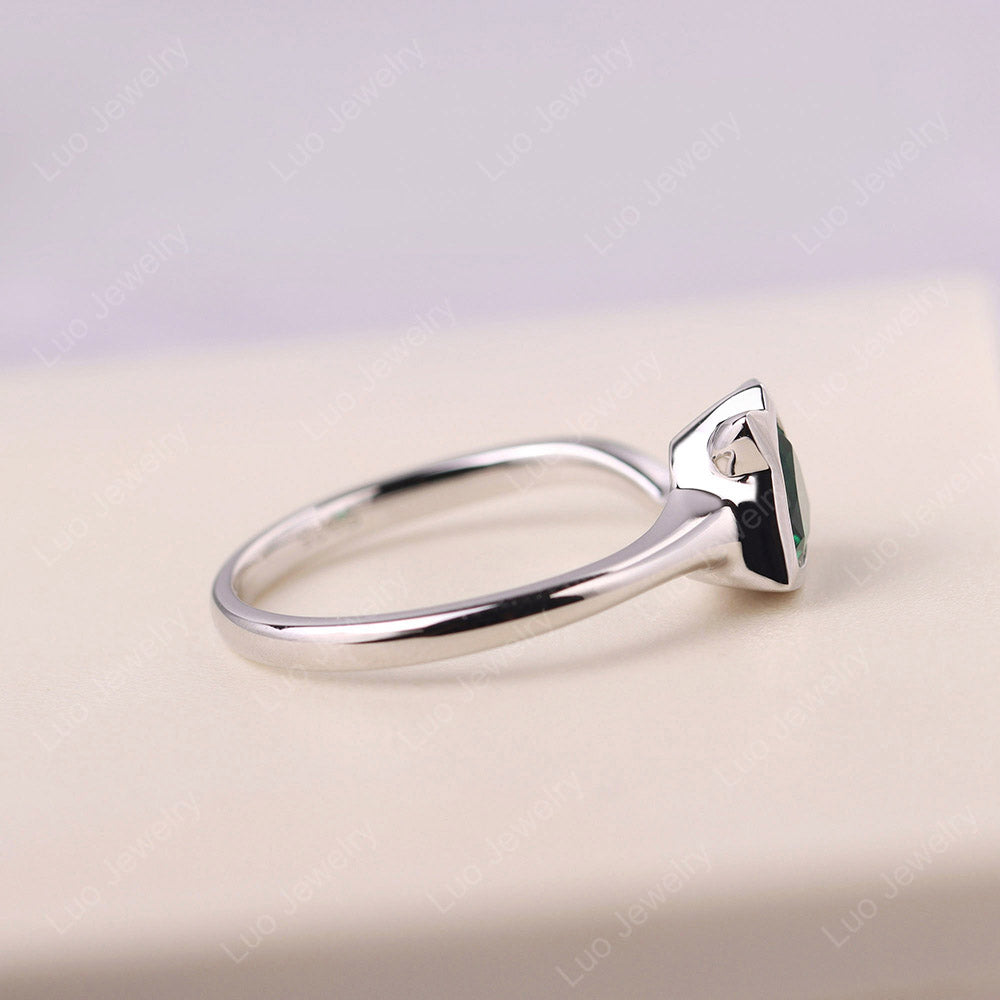 Cat Trillion Cut Emerald Bezel Ring