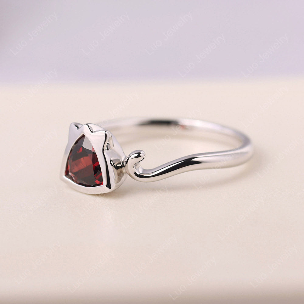 Cat Trillion Cut Garnet Bezel Ring
