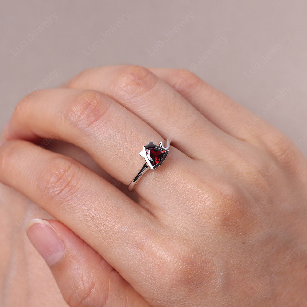 Cat Trillion Cut Garnet Bezel Ring