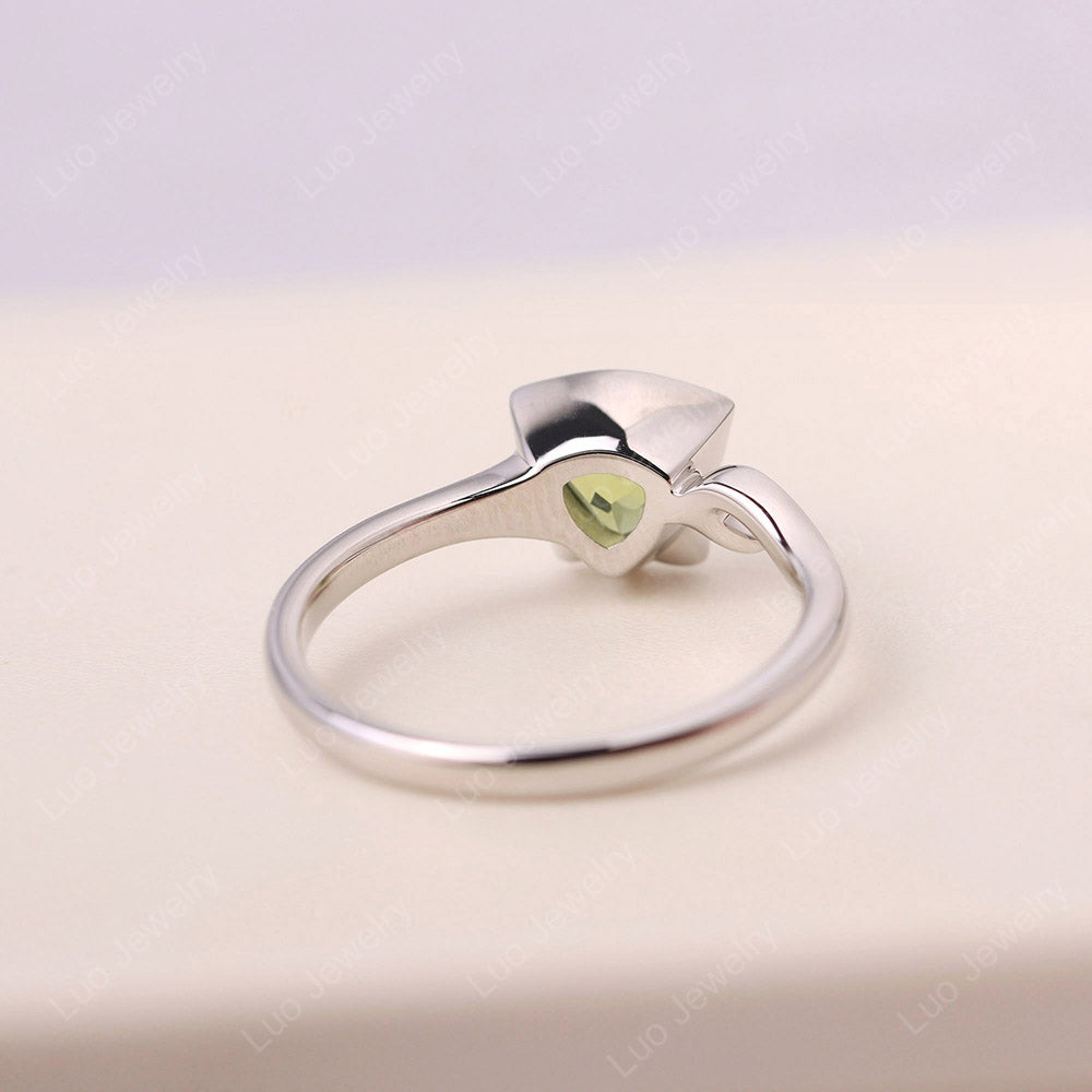 Cat Trillion Cut Peridot Bezel Ring