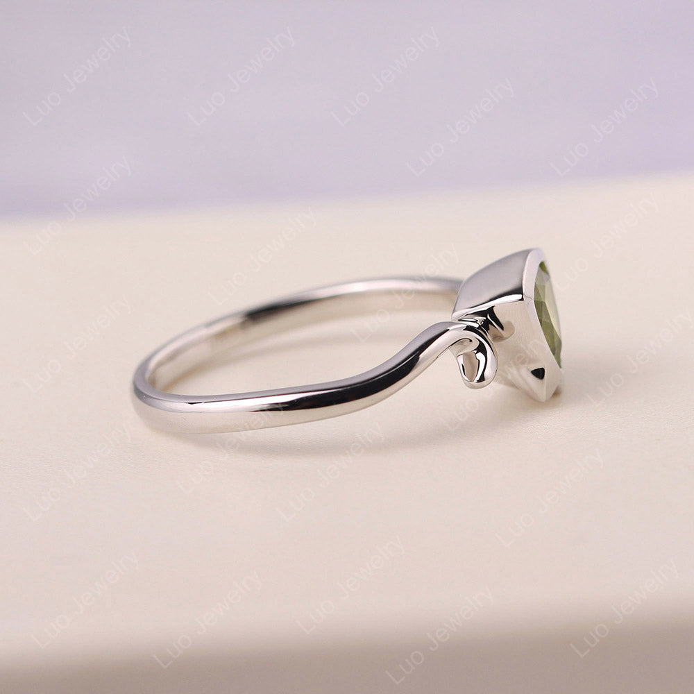 Cat Trillion Cut Peridot Bezel Ring