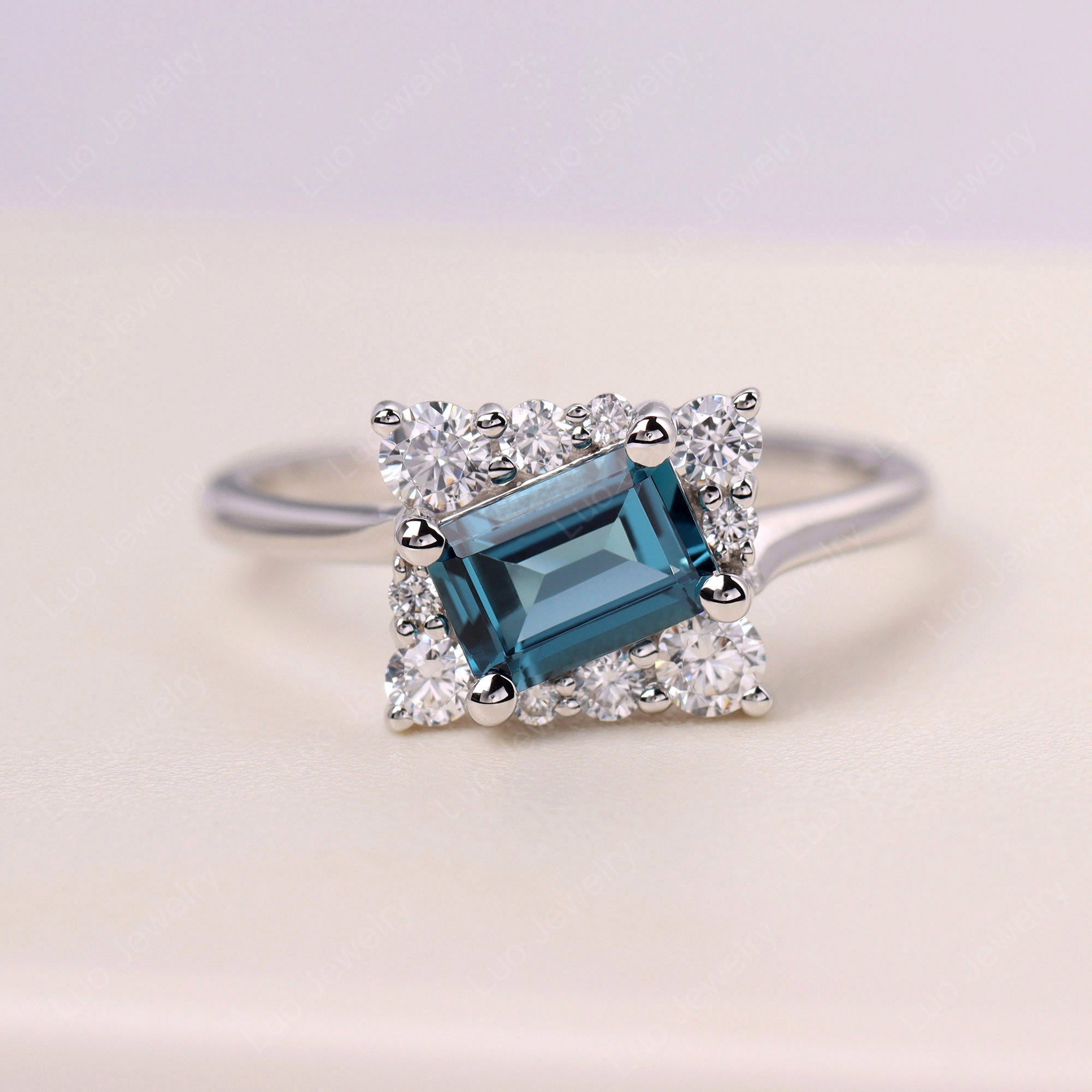 Emerald Cut London Blue Topaz Halo Ring