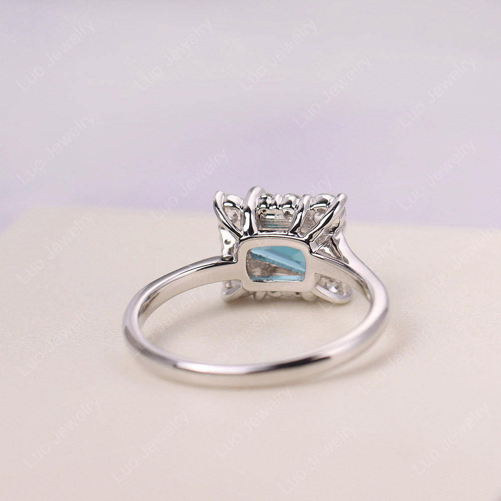 Emerald Cut London Blue Topaz Halo Ring