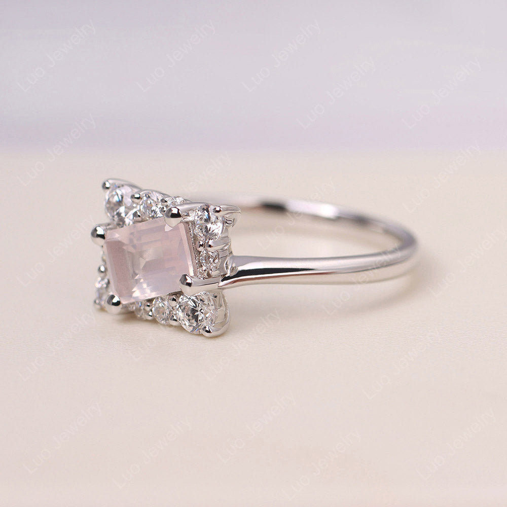 Anillo con halo de cuarzo rosa de talla esmeralda