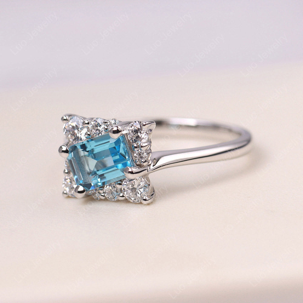 Emerald Cut Swiss Blue Topaz Halo Ring