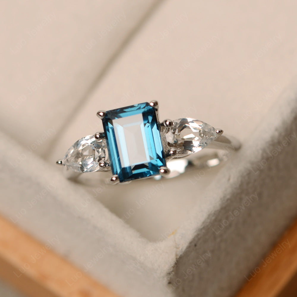 Emerald Cut London Blue Topaz Ring With Pear Side Stone - LUO Jewelry