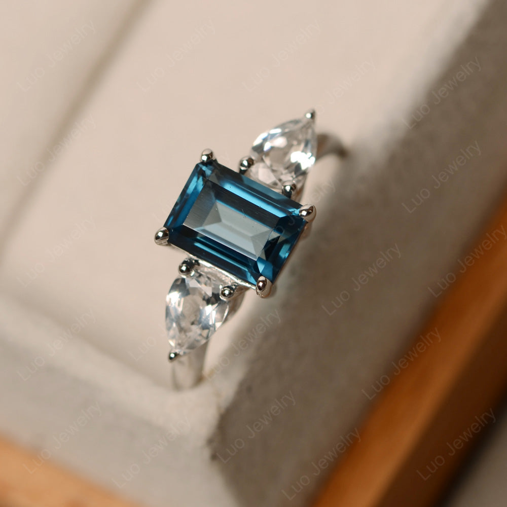 Emerald Cut London Blue Topaz Ring With Pear Side Stone - LUO Jewelry