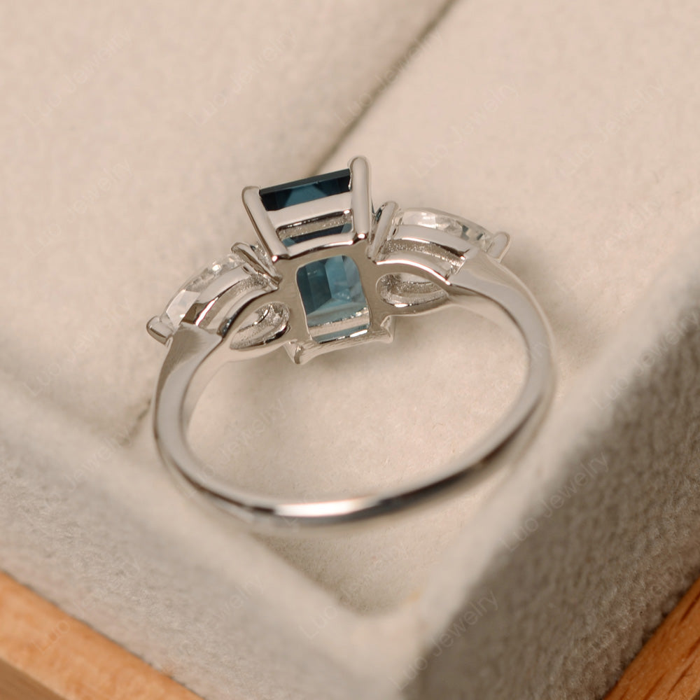 Emerald Cut London Blue Topaz Ring With Pear Side Stone - LUO Jewelry
