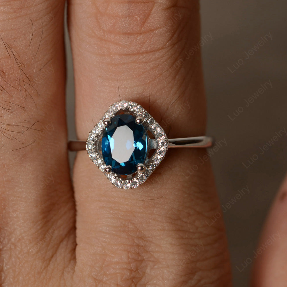 Oval London Blue Topaz Flower Halo Engagement Ring - LUO Jewelry