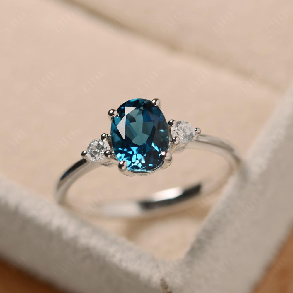 Simple Oval Cut London Blue Topaz Trilogy Ring - LUO Jewelry