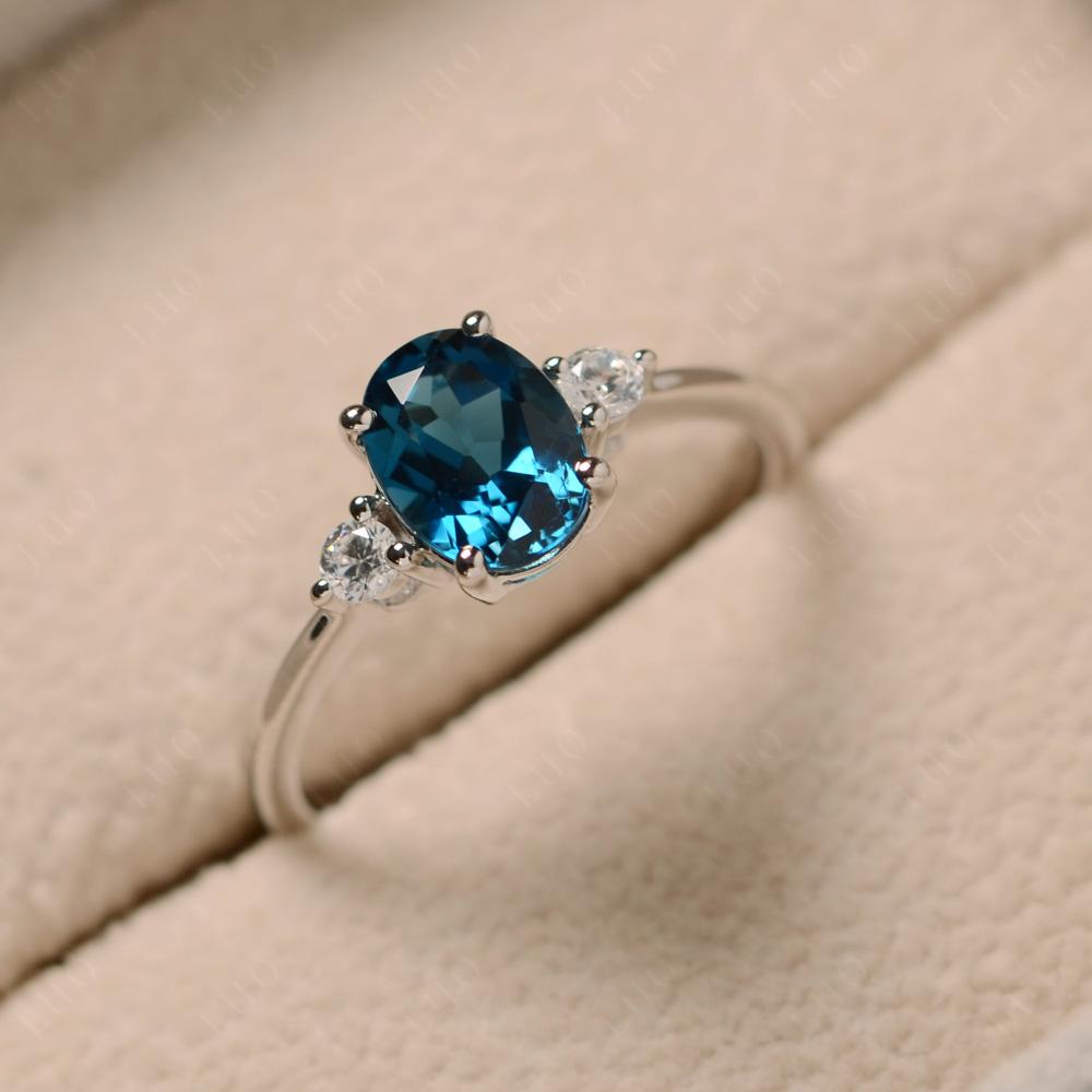 Simple Oval Cut London Blue Topaz Trilogy Ring - LUO Jewelry