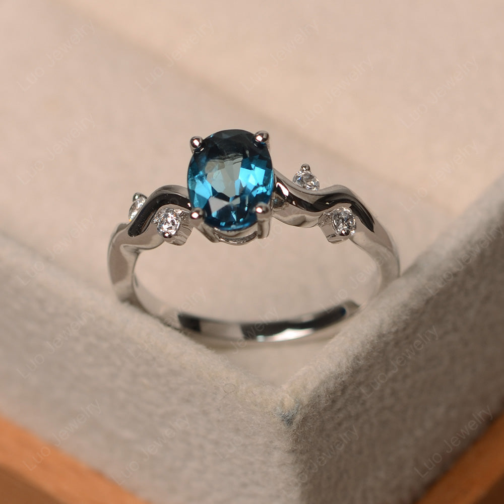 Oval Eccentric London Blue Topaz Ring Yellow Gold - LUO Jewelry
