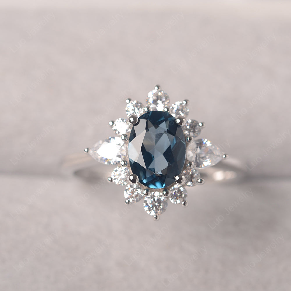 Oval Cut London Blue Topaz Ring With Pear Side Stone - LUO Jewelry