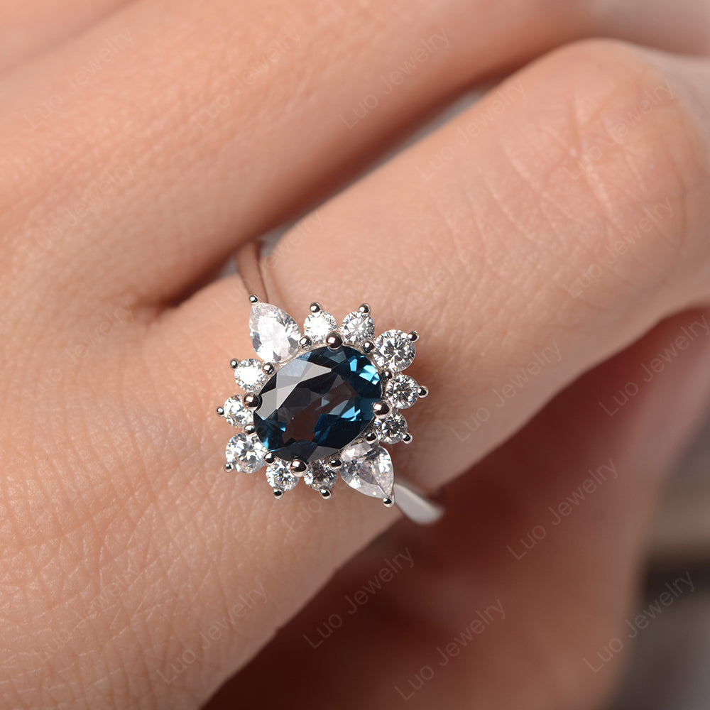 Oval Cut London Blue Topaz Ring With Pear Side Stone - LUO Jewelry