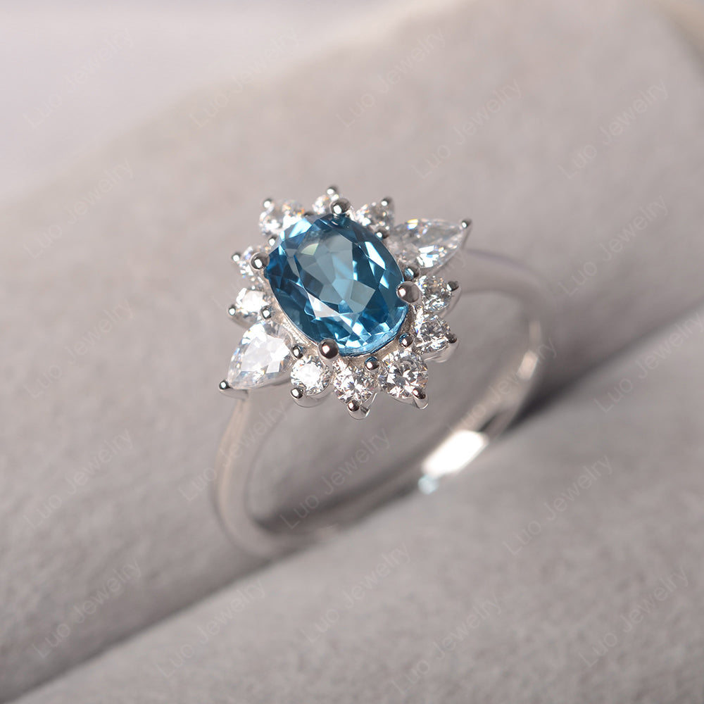 Oval Cut Swiss Blue Topaz Ring With Pear Side Stone - LUO Jewelry