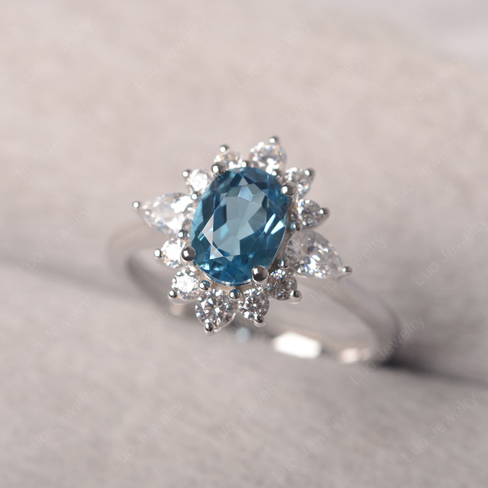Oval Cut Swiss Blue Topaz Ring With Pear Side Stone - LUO Jewelry