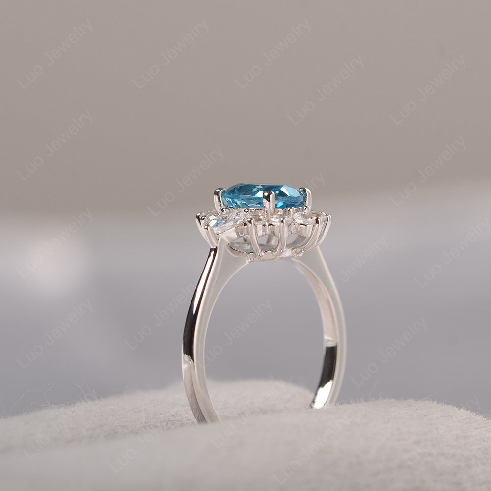 Oval Cut Swiss Blue Topaz Ring With Pear Side Stone - LUO Jewelry