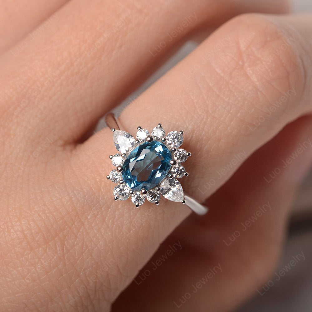 Oval Cut Swiss Blue Topaz Ring With Pear Side Stone - LUO Jewelry