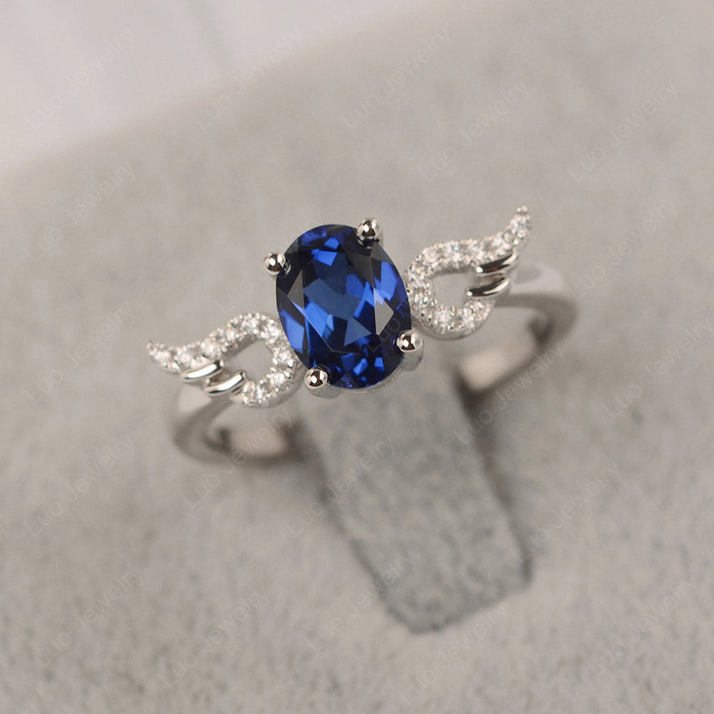 Oval Sapphire Angel Wing Ring