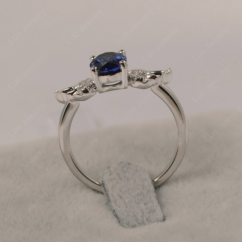 Oval Sapphire Angel Wing Ring