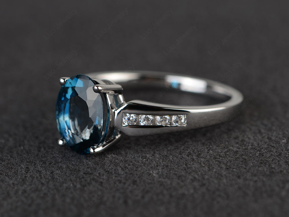 Oval Cut London Blue Topaz Ring With Channel Set Band - LUO Jewelry