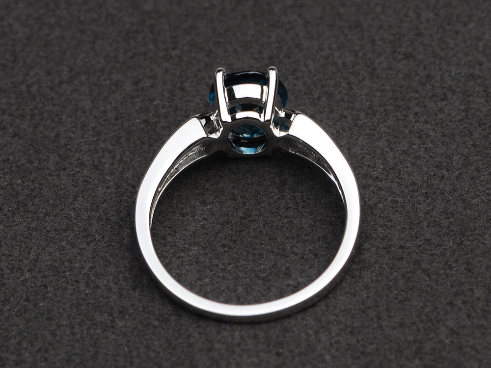 Oval Cut London Blue Topaz Ring With Channel Set Band - LUO Jewelry