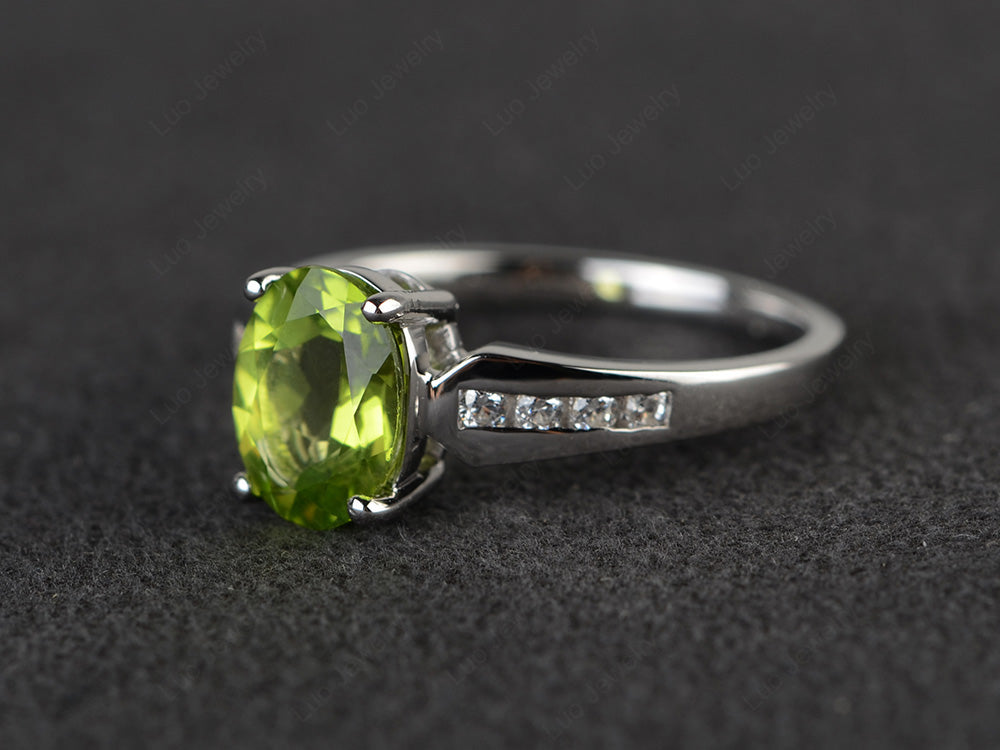 Oval Cut Peridot Ring With Channel Set Band - LUO Jewelry