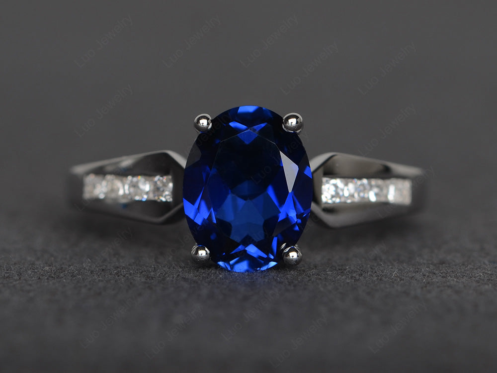 Oval Cut Lab Sapphire Ring With Channel Set Band - LUO Jewelry