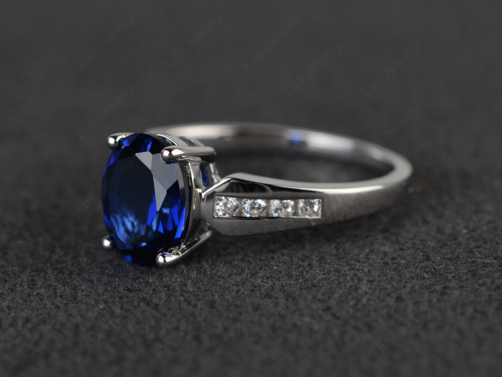 Oval Cut Lab Sapphire Ring With Channel Set Band - LUO Jewelry