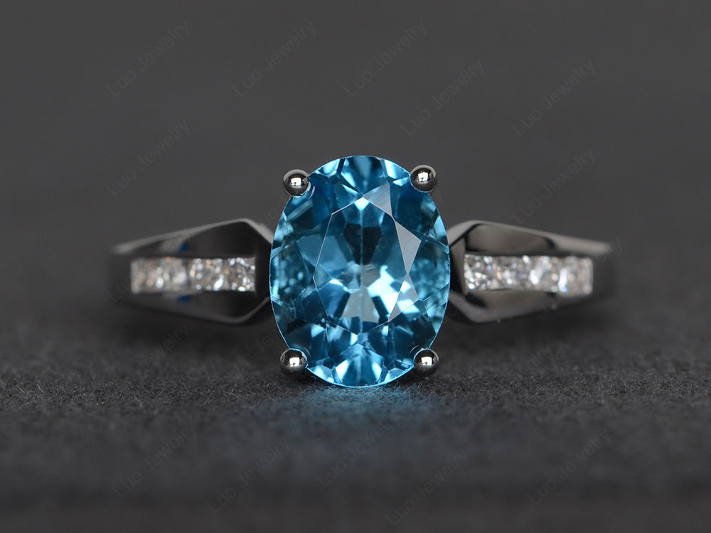 Oval Cut Swiss Blue Topaz Ring With Channel Set Band - LUO Jewelry