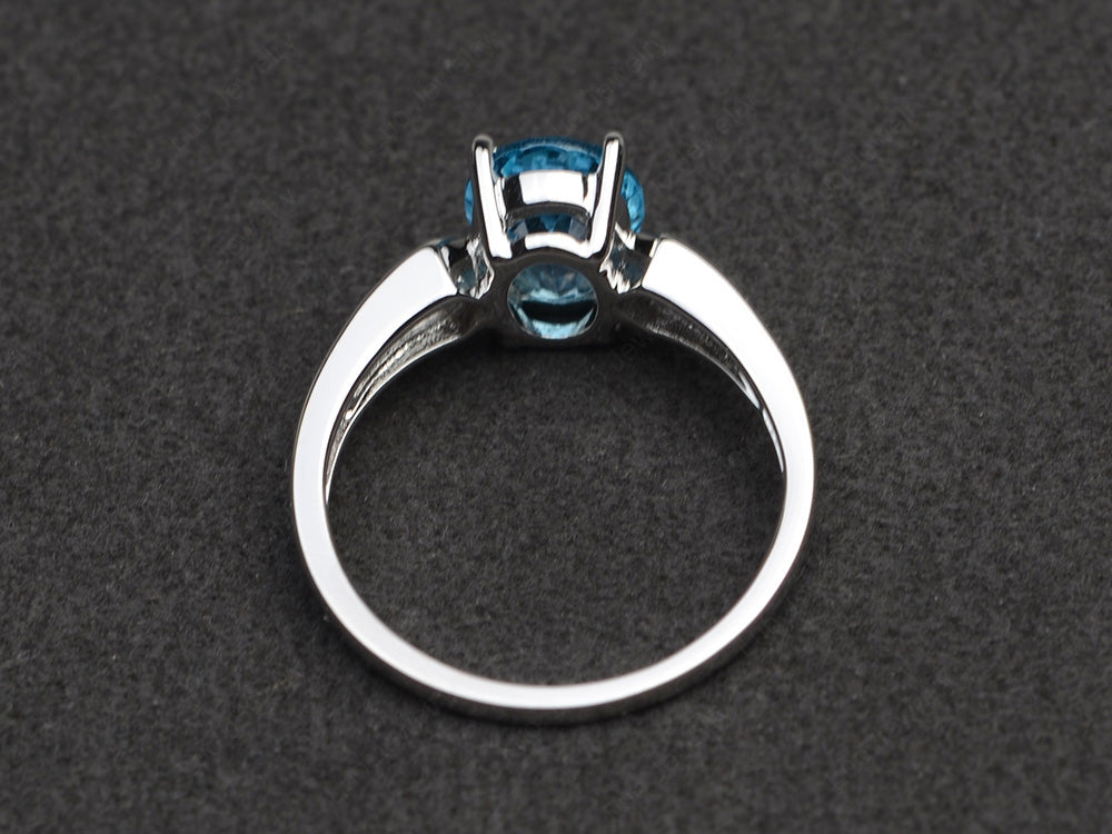 Oval Cut Swiss Blue Topaz Ring With Channel Set Band - LUO Jewelry