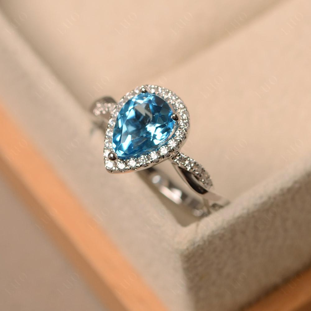 Pear Shaped Swiss Blue Topaz Twisted Halo Ring - LUO Jewelry