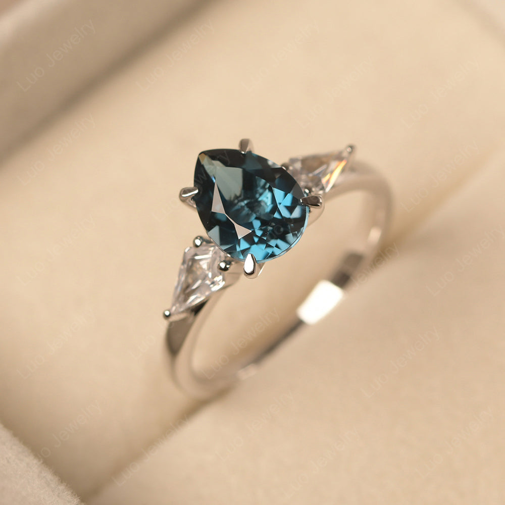 Pear Shaped London Blue Topaz Ring With Kite Side Stone - LUO Jewelry