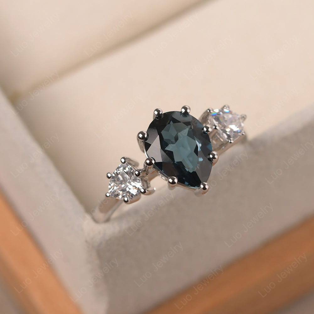 Pear London Blue Topaz Ring With Trillion Side Stone - LUO Jewelry