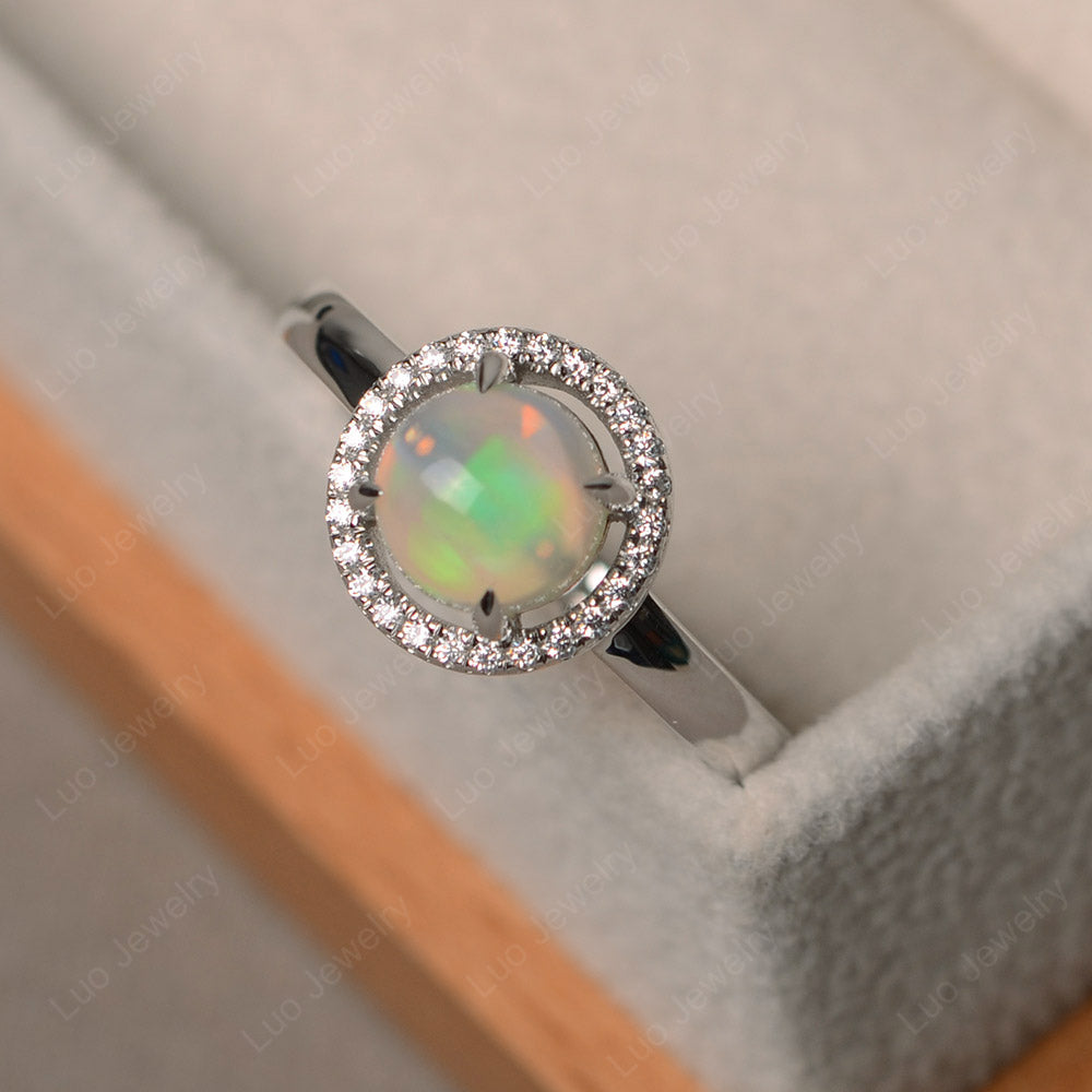 Opal Cabochon Halo Ring