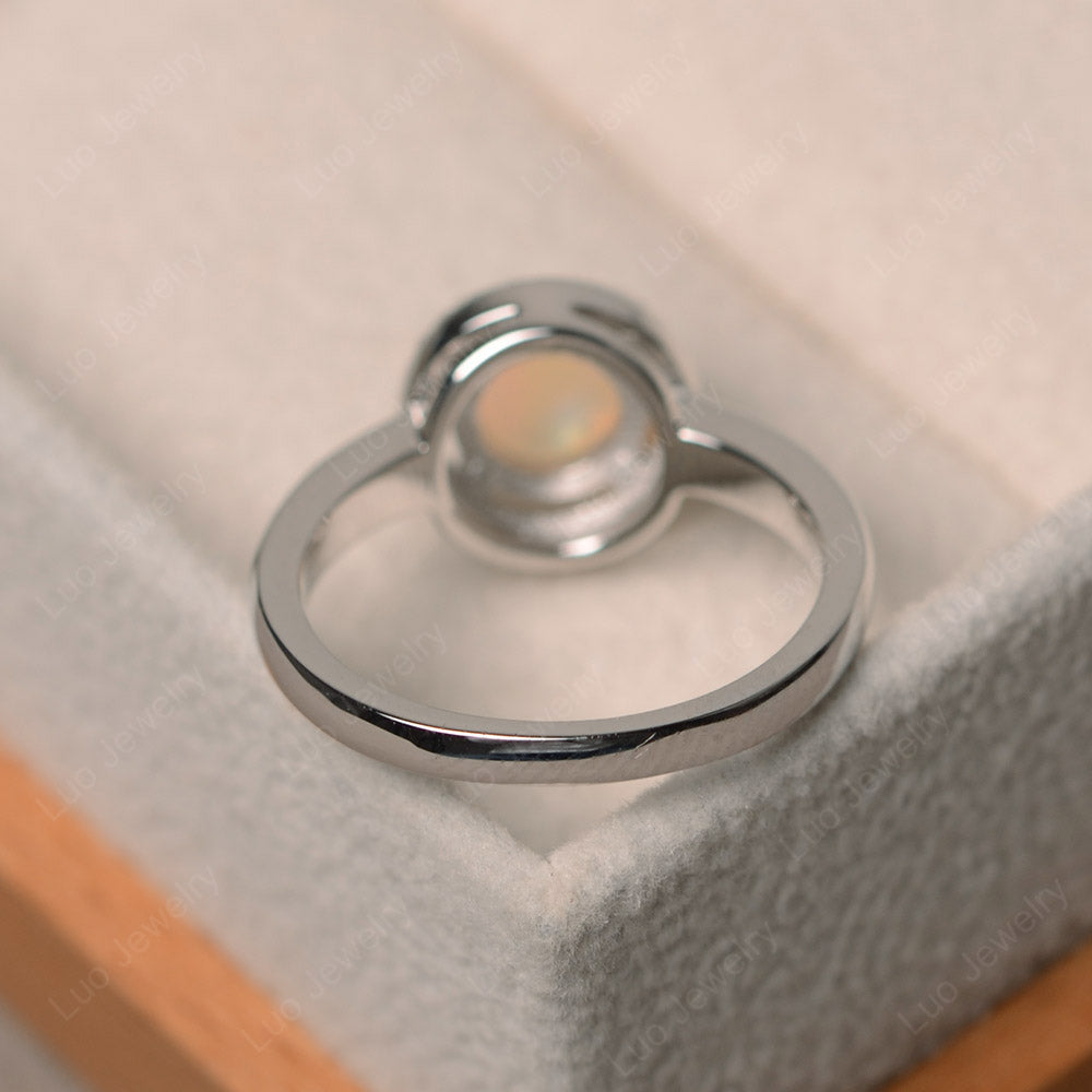 Opal Cabochon Halo Ring