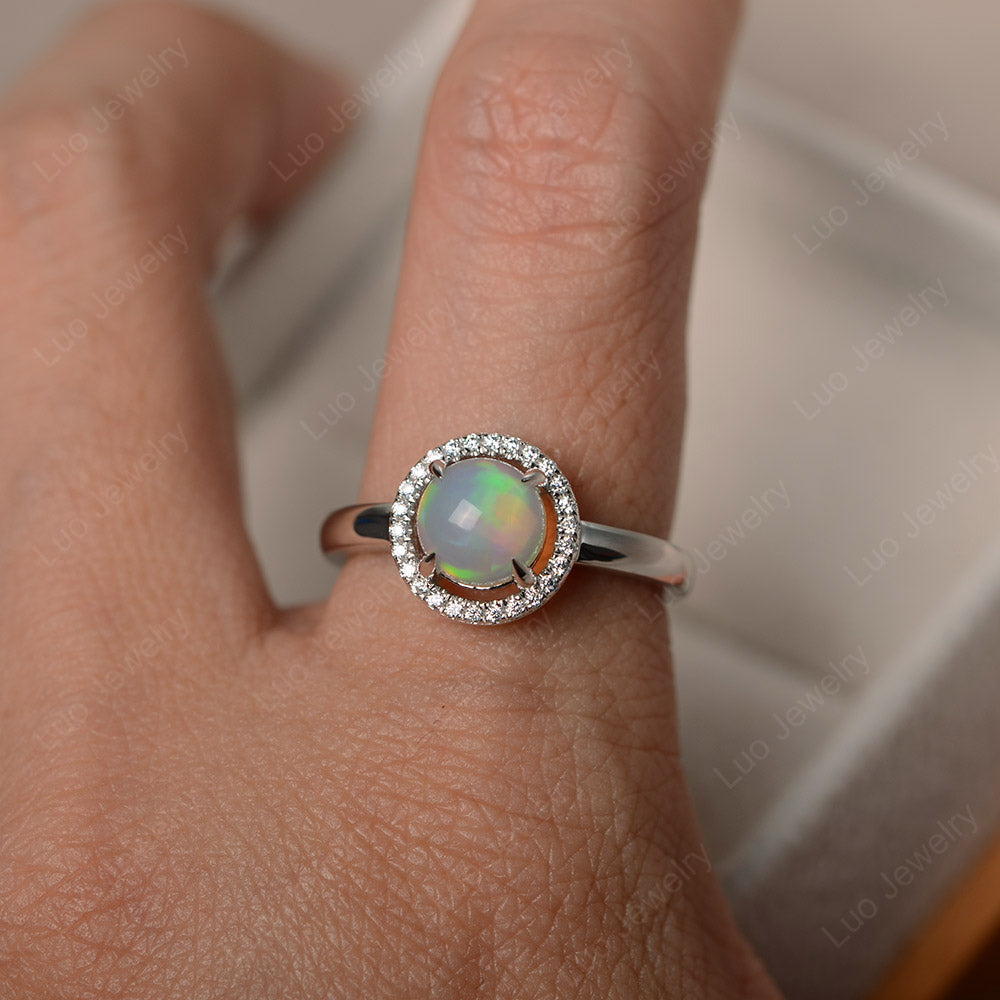 Opal Cabochon Halo Ring