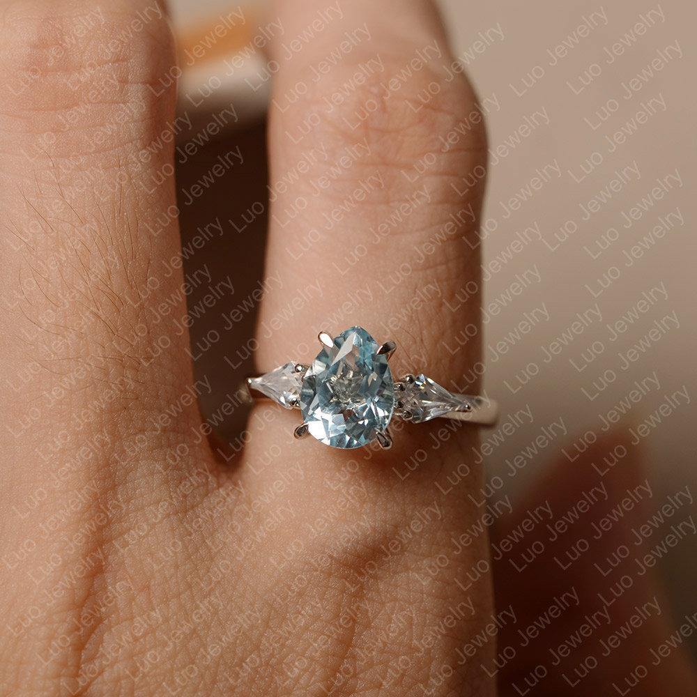 Pear Shaped Sky Blue Topaz Ring With Kite Side Stone - LUO Jewelry