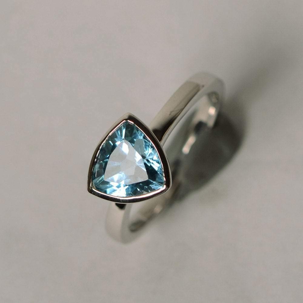 Solitaire Swiss Blue Topaz Ring Trillion Cut Gold - LUO Jewelry