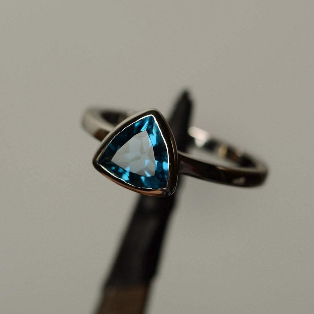 Solitaire London Blue Topaz Ring Trillion Cut Gold - LUO Jewelry